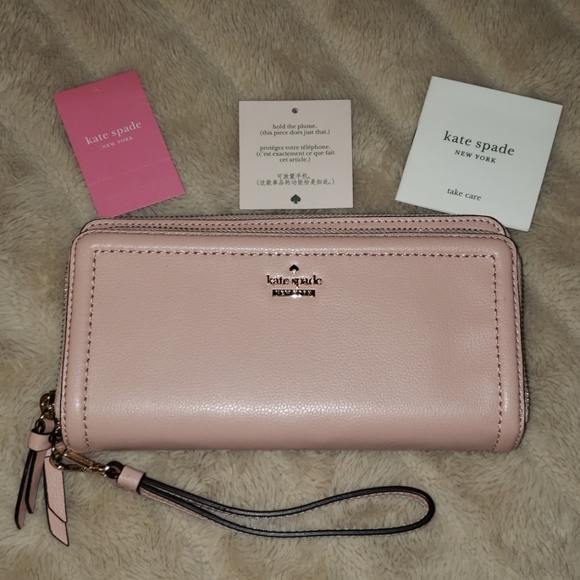 kate spade Handbags - KATE SPADE Rosycheeks Wristlet Wallet